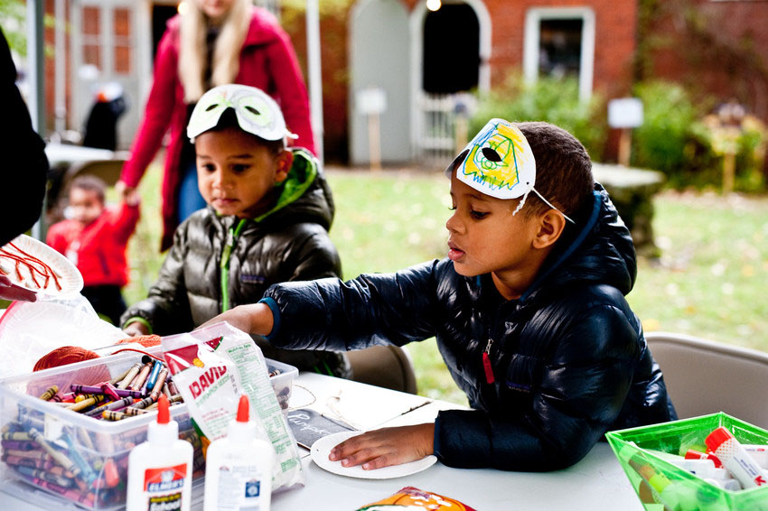 Children wear masks and make Halloween crafts at Wicked Wednesdays at Phillips House