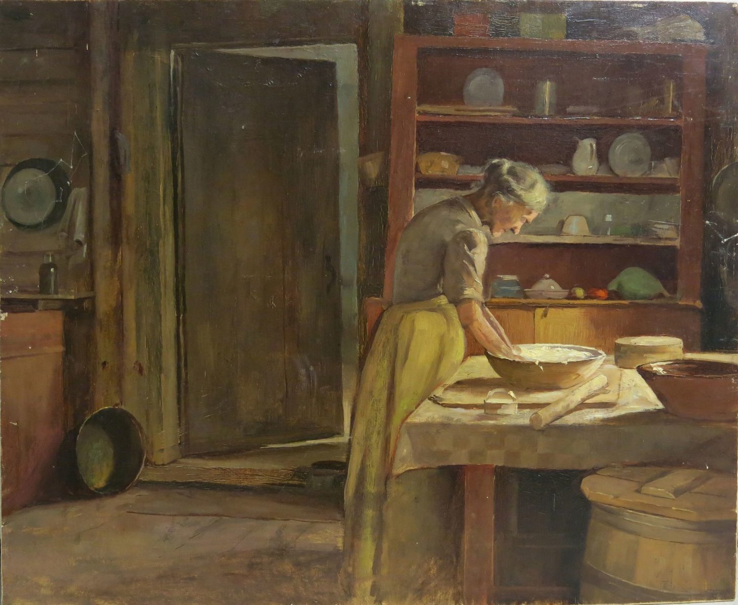 Painting of woman baking bread in the kitchen